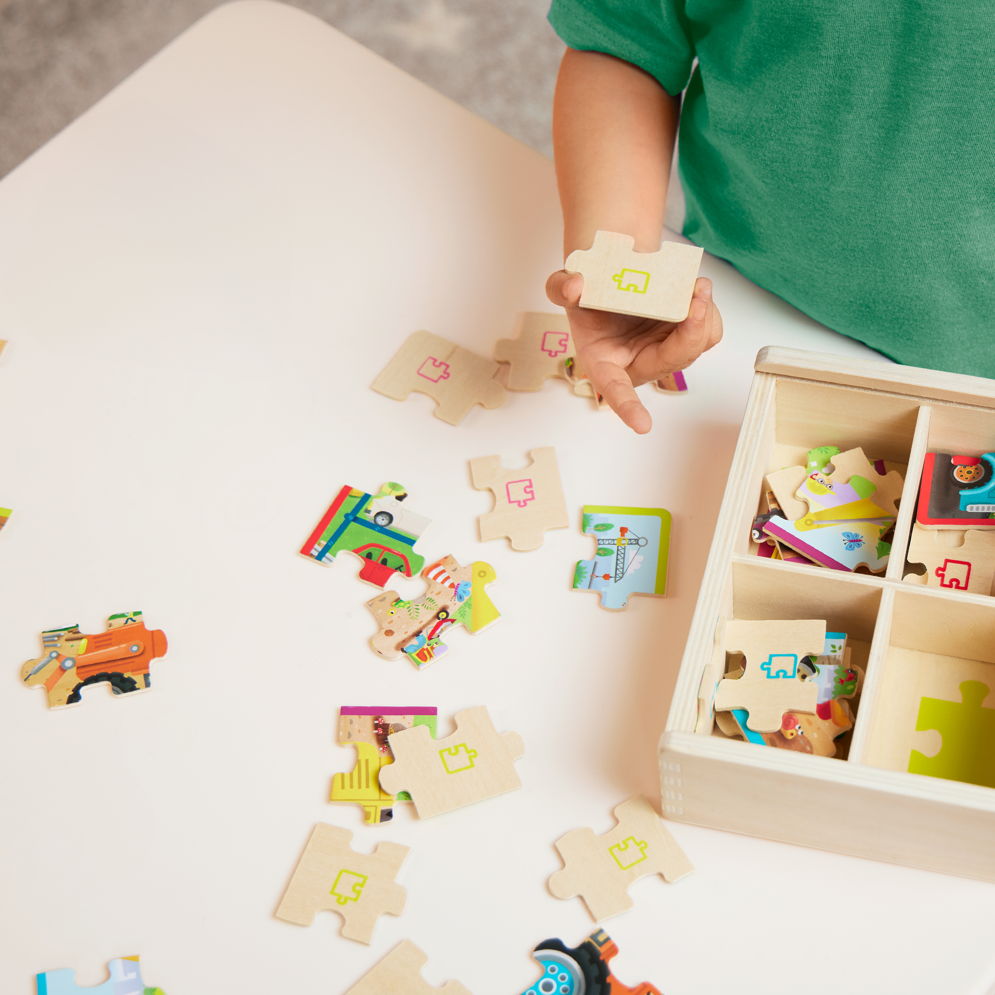 B. toys wooden puzzles and creative play sets